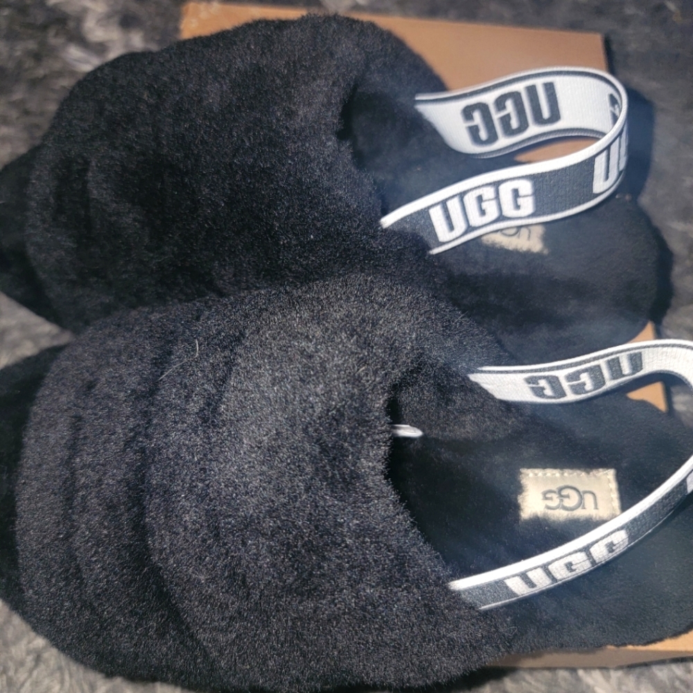 Furry UGG slides in black